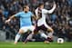 MANCHESTER, ENGLAND - MAY 07: Ashley Westwood of Aston Villa is closed down by Pablo Zabaleta of Manchester City during the Barclays Premier League match between Manchester City and Aston Villa at Etihad Stadium on May 7, 2014 in Manchester, England. (P