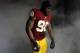 Dec 22, 2013; Landover, MD, USA; Washington Redskins outside linebacker Brian Orakpo (98) prepares to run onto the field prior to the Redskins' game against the Dallas Cowboys at FedEx Field. The Cowboys won 24-23. Mandatory Credit: Geoff Burke-USA TODAY