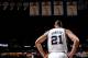 SAN ANTONIO, TX - JUNE 16: Tim Duncan #21 of the San Antonio Spurs stands under the team's four Championship banners while playing the Miami Heat during Game Five of the 2013 NBA Finals on June 16, 2013 at AT&T Center in San Antonio, Texas. NOTE TO USER: