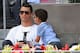 MADRID, SPAIN - MAY 08: Real Madrid footballer Cristiano Ronaldo and his son Cristiano Ronaldo Junior watch Rafael Nadal of Spain against Jarkko Nieminen of Finland in their third round match during day six of the Mutua Madrid Open tennis tournament at t