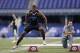 INDIANAPOLIS, IN - FEBRUARY 24: Former Missouri defensive lineman Michael Sam takes part in position drills during the 2014 NFL Combine at Lucas Oil Stadium on February 24, 2014 in Indianapolis, Indiana. (Photo by Joe Robbins/Getty Images)