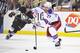 PITTSBURGH, PA - MAY 9: Ryan McDonagh #27 of the New York Rangers passes the puck during the third period against the Pittsburgh Penguins in Game Five of the Second Round of the 2014 NHL Stanley Cup Playoffs on May 9, 2014 at CONSOL Energy Center in Pitt