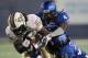 Oct 20, 2012; Memphis, TN, USA; Memphis Tigers wide receiver Breshad Perriman (81) is tackled by UCF Knights defensive backs Lonnie Ballentine (4) and Robert Steeples (22) at Liberty Bowl Memorial Stadium. UCF defeated Memphis 35-17. Mandatory Credit: Ne