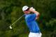 PONTE VEDRA BEACH, FL - MAY 10: John Senden of Australia hits his approach shot on the 14th hole during the third round of THE PLAYERS Championship on the stadium course at TPC Sawgrass on May 10, 2014 in Ponte Vedra Beach, Florida. (Photo by Sam Greenw