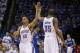 OKLAHOMA CITY, OK - MAY 7: Thabo Sefolosha #25 and Kevin Durant #35 of the Oklahoma City Thunder celebrate during a game against the Los Angeles Clippers in Game 2 of the Western Conference Semifinals during the 2014 NBA Playoffs at the Chesapeake Arena o