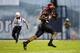 Dec 20, 2012; San Diego, CA, USA; San Diego State Aztecs defensive back Eric Pinkins (27) runs with the ball after making an interception during the second quarter against the Brigham Young Cougars at Qualcomm Stadium. Mandatory Credit: Jake Roth-USA TODA