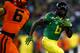 EUGENE, OR - NOVEMBER 29: De'Anthony Thomas #6 of the Oregon Ducks runs the ball against the Oregon State Beavers during the 117th playing of the Civil War on November 29, 2013 at the Autzen Stadium in Eugene, Oregon. (Photo by Jonathan Ferrey/Getty Ima