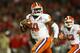 MIAMI GARDENS, FL - JANUARY 03: Tajh Boyd #10 of the Clemson Tigers runs for a touchdown in the first half against the Ohio State Buckeyes during the Discover Orange Bowl at Sun Life Stadium on January 3, 2014 in Miami Gardens, Florida. (Photo by Street