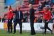 WIGAN, ENGLAND - MAY 09: Harry Redknapp the manager of Queens Park Rangers and his assistant Joe Jordan react as Uwe Rosler the manager of Wigan Athletic looks on during the Sky Bet Championship Play Off Semi Final first leg match between Wigan Athletic