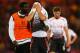 LONDON, ENGLAND - MAY 05: Kolo Toure of Liverpool consoles the dejected Luis Suarez of Liverpool following their team's 3-3 draw during the Barclays Premier League match between Crystal Palace and Liverpool at Selhurst Park on May 5, 2014 in London, Engl