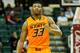 ORLANDO, FL - DECEMBER 01: Marcus Smart #33 of the Oklahoma State Cowboys sets up the offense in a game against the Memphis Tigers during the Old Spice Classic at HP Field House on December 1, 2013 in Orlando, Florida. (Photo by Sam Greenwood/Getty Imag