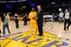 LOS ANGELES, CA - FEBRUARY 17: Kobe Bryant #24 of the Los Angeles Lakers is presented with the Western Conference Player of the Week award from General Manager Mitch Kupchak before a game against the Phoenix Suns at Staples Center on February 17, 2012 in