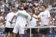 Andre Agassi and Pete Sampras shake hands with young James Blake and Andy Roddick