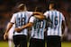 ST. LOUIS, MO - NOVEMBER 18: Teammates congratulate Sergio Aguero #10 of Argentina after Aguero scored his second goal of the match during the international friendly match between Bosnia-Herzegovina and Argentina at Busch Stadium on November 18, 2013 in S
