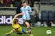 STOCKHOLM, SWEDEN - FEBRUARY 06: Ramus Elm of Sweden battles with Lionel Messi of Argentina during the International Friendly match between Sweden and Argentina at the Friends Arena on February 6, 2013 in Stockholm, Sweden. (Photo by Jamie McDonald/Gett