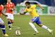 TORONTO, ON - NOVEMBER 19: Neymar #10 of Brazil takes the ball in the first half against Chile during a friendly match at Rogers Centre on November 19, 2013 in Toronto, Canada. (Photo by Elsa/Getty Images)