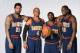 DENVER, CO - MARCH 4: Wilson Chandler #21 Randy Foye #4, Ty Lawson #3 and Kenneth Faried #35 of the Denver Nuggets pose for photos wearing the uniforms from the 1993-1994 season on March 4, 2014 at the Pepsi Center in Denver, Colorado. NOTE TO USER: User