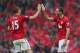 MANCHESTER, ENGLAND - MAY 12: Rio Ferdinand of Manchester United celebrates scoring the winning goal with team-mate Nemanja Vidic during the Barclays Premier League match between Manchester United and Swansea City at Old Trafford on May 12, 2013 in Manch