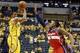 May 5, 2014; Indianapolis, IN, USA; Indiana Pacers guard George Hill (3) takes a three point shot against Washington Wizards guard Bradley Beal (3) in game one of the second round of the 2014 NBA Playoffs at Bankers Life Fieldhouse. Washington won 102-96.