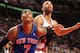 CHICAGO, IL - APRIL 10: Carmelo Anthony #7 of the New York Knicks battles for postion with Taj Gibson #22 of the Chicago Bulls during the game on April 10, 2012 at the United Center in Chicago, Illinois. NOTE TO USER: User expressly acknowledges and agree