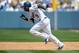 Apr 4, 2014; Los Angeles, CA, USA; Los Angeles Dodgers second baseman Dee Gordon (9) steals second base in the third inning of the game against the San Francisco Giants at Dodger Stadium. Mandatory Credit: Jayne Kamin-Oncea-USA TODAY Sports