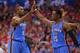 LOS ANGELES, CA - MAY 09: Serge Ibaka #9 and Reggie Jackson #15 of the Oklahoma City Thunder high five against the Los Angeles Clippers in Game Three of the Western Conference Semifinals during the 2014 NBA Playoffs at Staples Center on May 9, 2014 in Lo