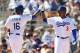 GLENDALE, AZ - MARCH 10: Carl Crawford #3 of the Los Angeles Dodgers high fives Andre Ethier #16 after Ethier hit a three run home-run against the Oakland Athletics during the first inning of the spring training game at Camelback Ranch on March 10, 2014