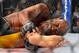 Dec 28, 2013; Las Vegas, NV, USA; Anderson Silva reacts after breaking his leg on a kick to Chris Weidman (not pictured) during their UFC middleweight championship bout at the MGM Grand Garden Arena. Mandatory Credit: Jayne Kamin-Oncea-USA TODAY Sports