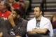 May 12, 2014; Portland, OR, USA; San Antonio Spurs forward Tim Duncan (left) and guard Manu Ginobili react from the bench in the second half of game four of the second round of the 2014 NBA Playoffs against the Portland Trail Blazers at the Moda Center.