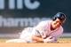 BOSTON, MA - APRIL 13: Jacoby Ellsbury #2 of the Boston Red Sox reacts after he was injured in a double play in the bottom of the fourth inning against the Tampa Bay Rays during the home opener on April 13, 2012 at Fenway Park in Boston, Massachusetts.