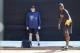 Feb 14, 2014; Tampa, FL, USA; New York Yankees starting pitcher Michael Pineda (35) throws a bull pen session as pitching coach Larry Rothschild (58) looks on as he works out as pitchers and catchers report for spring training at George M. Steinbrenner Fi