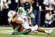 SAN ANTONIO, TX - DECEMBER 30: Running back De'Anthony Thomas #6 of the Oregon Ducks is tackled by defensive end Jackson Jeffcoat #44 of the Texas Longhorns in the second quarter of the Valero Alamo Bowl at the Alamodome on December 30, 2013 in San Antoni