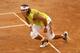 ROME - MAY 14: Rafael Nadal of Spain celebrates his five set victory against Roger Federer of Switzerland in the final of the ATP Masters Series on May 14, 2006 at the Foro Italico in Rome, Italy. (Photo by Clive Brunskill/Getty Images)