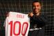 BURTON-UPON-TRENT, ENGLAND - FEBRUARY 04: Ashley Cole of England poses with a shirt to celebrate reaching 100 caps in Wednesday's friendly international against Brazil at Wembley, following an Engand training session at St Georges Park on February 4, 201