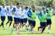 Arsenal players don Pumas in training