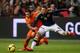 AMSTERDAM, NETHERLANDS - NOVEMBER 19: Memphis Depay of Netherlands in action with Santiago Arias of Columbia during the friendly International match between the Netherlands and Columbia at the Amsterdam Arena on November 19, 2013 in Amsterdam, Netherland