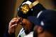 JERSEY CITY, NJ - JANUARY 29: Marshawn Lynch #24 of the Seattle Seahawks sits in front of the media during an availability January 29, 2014 in Jersey City, New Jersey. The Denver Broncos and Seattle Seahawks will meet at Super Bowl XLVIII at Metlife St