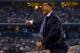 ARLINGTON, TX - APRIL 07: Head coach Kevin Ollie of the Connecticut Huskies calls to his players during the NCAA Men's Final Four Championship against the Kentucky Wildcats at AT&T Stadium on April 7, 2014 in Arlington, Texas. (Photo by Ronald Martinez/G