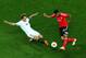 TURIN, ITALY - MAY 14: Ivan Rakitic of Sevilla slides in to tackle Ezequiel Garay of Benfica during the UEFA Europa League Final match between Sevilla FC and SL Benfica at Juventus Stadium on May 14, 2014 in Turin, Italy. (Photo by Ian Walton/Getty Imag