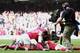 CARDIFF, UNITED KINGDOM - MAY 21: The Arsenal team celebrate Patrick Vieira scoring the last penalty after winning the FA Cup Final between Arsenal and Manchester United 5-4 at The Millennium Stadium on May 21, 2005 in Cardiff, Wales. (Photo by Ross Kinn