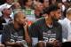 SAN ANTONIO, TX - MAY 14: Tony Parker #9 and Tim Duncan #21 of the San Antonio Spurs look on from the bench in Game Five of the Western Conference Semifinals against the Portland Trail Blazers during the 2014 NBA Playoffs on May 14, 2014 at the AT&T Cente