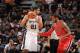 SAN ANTONIO, TX - MAY 14: Tim Duncan #21 of the San Antonio Spurs controls the ball against LaMarcus Aldridge #12 of the Portland Trail Blazers in Game Five of the Western Conference Semifinals during the 2014 NBA Playoffs on May 14, 2014 at the AT&T Cent