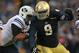 SOUTH BEND, IN - OCTOBER 20: Louis Nix III #9 of the Notre Dame Fighting Irish rushes against Blair Tushaus #54 of the BYU Cougars at Notre Dame Stadium on October 20, 2012 in South Bend, Indiana. Notre Dame defeated BYU 17-14. (Photo by Jonathan Daniel