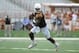 Apr 19, 2014; Austin, TX, USA; Texas Longhorns quarterback Tyrone Swoopes (18) scrambles during the Spring Game at Texas Memorial Stadium. Mandatory Credit: Brendan Maloney-USA TODAY Sports