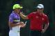 Rickie Fowler, Adam Scott make a colorful pair.