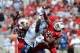 September 15, 2012; Louisville, KY USA; Louisville Cardinals safety Hakeem Smith (29) and safety Calvin Pryor (25) break up a pass intended for North Carolina Tar Heels tight end Eric Ebron (85) during the first half of play at Papa John's Cardinals Sta