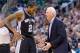 Nov 15, 2013; Salt Lake City, UT, USA; San Antonio Spurs head coach Gregg Popovich talks with small forward Kawhi Leonard (2) during the second half against the Utah Jazz at EnergySolutions Arena. San Antonio won 91-82. Mandatory Credit: Russ Isabella-USA