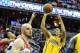 May 15, 2014; Washington, DC, USA; Indiana Pacers point guard George Hill (3) shoots as Washington Wizards shooting guard Bradley Beal (3) defends during the first half in game six of the second round of the 2014 NBA Playoffs at Verizon Center. Mandatory