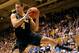 DURHAM, NC - DECEMBER 03: Mitch McGary #4 of the Michigan Wolverines pulls down a rebound against the Duke Blue Devils at Cameron Indoor Stadium on December 3, 2013 in Durham, North Carolina. Duke won 79-69. (Photo by Grant Halverson/Getty Images)