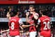 LONDON, ENGLAND - MAY 04: Olivier Giroud (C) of Arsenal celebrates with team mates after scoring during the Barclays Premier League match between Arsenal and West Bromwich Albion at the Emirates Stadium on May 4, 2014 in London, England. (Photo by Shaun
